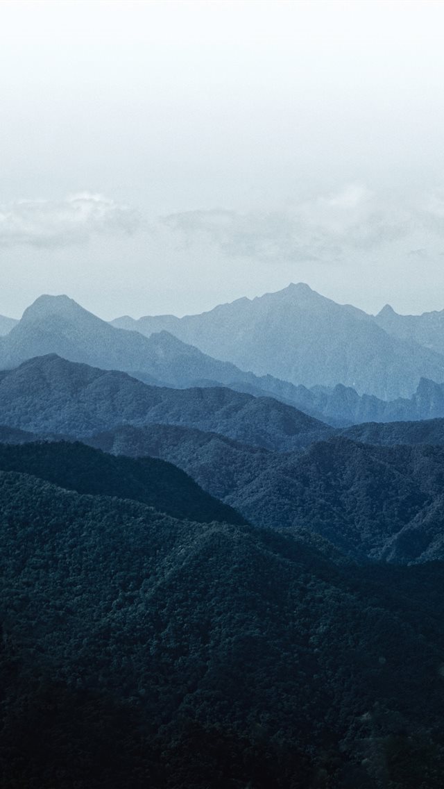 640x1136 green mountains under white sky during daytime - grey iPhone Wallpaper