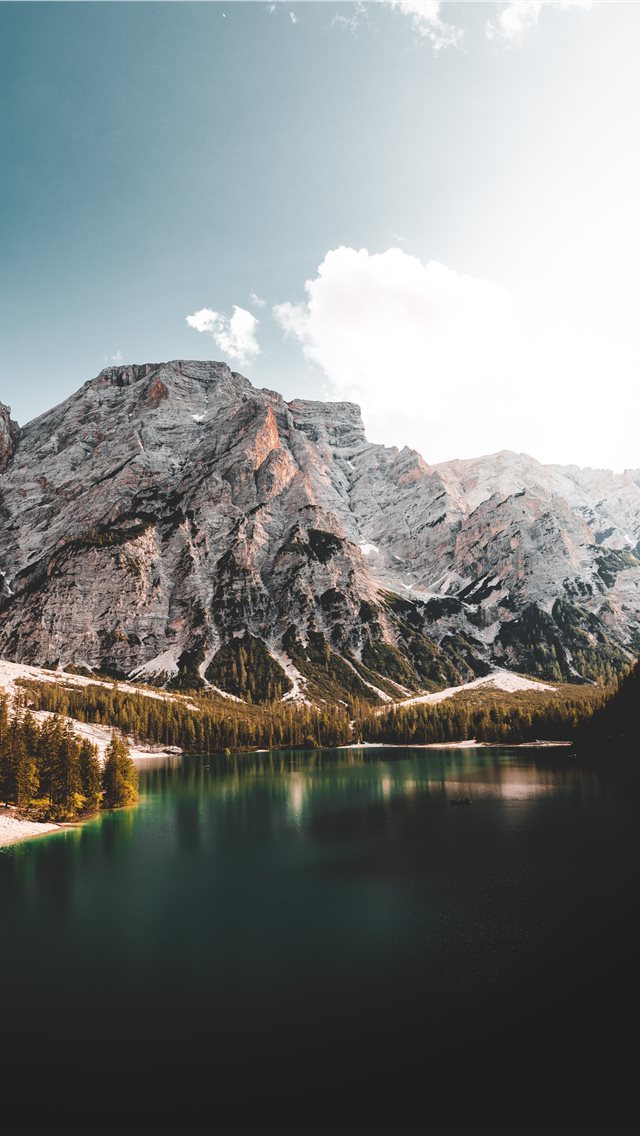 640x1136 lake near mountain under blue sky during daytime - mountain iPhone Wallpaper