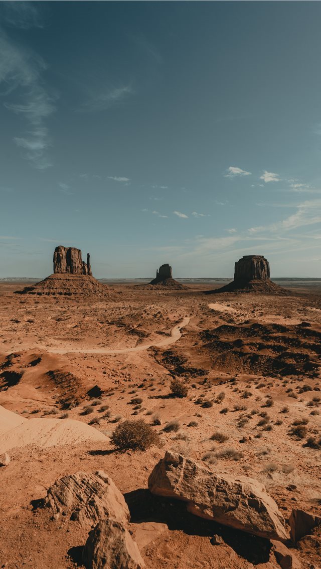 640x1136 brown rock formation under white clouds during day... - monument valley iPhone Wallpaper