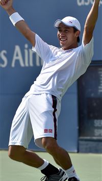 Kei Nishikori celebrates his US Open semifinal vic... wallpaper