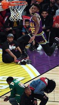 Donovan Mitchell Jumping Over His Sister Kevin Har... wallpaper