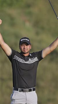 Emotions flow as Day breaks through with PGA title wallpaper