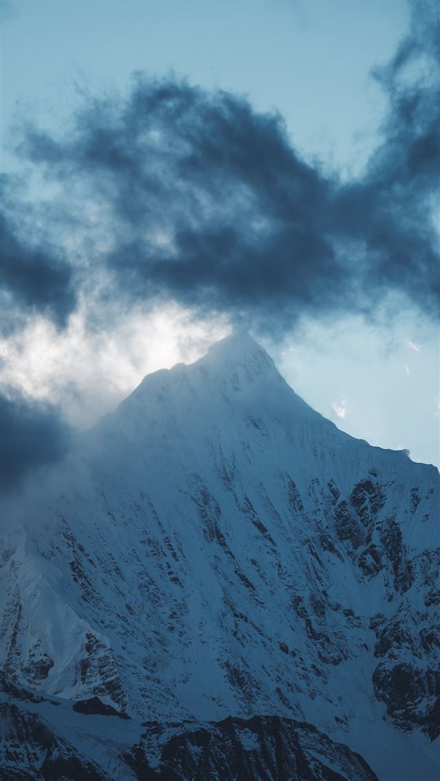 640x1136 snow covered mountain under gray clouds at daytime -  iPhone Wallpaper