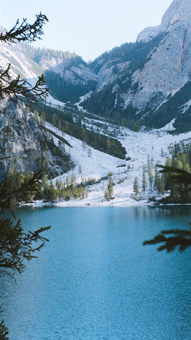blue calm lake by the icy mountain iPhone wallpaper 