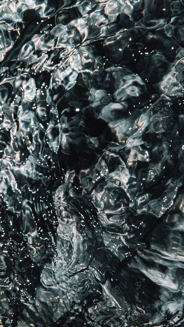 water splash on body of water iPhone wallpaper 