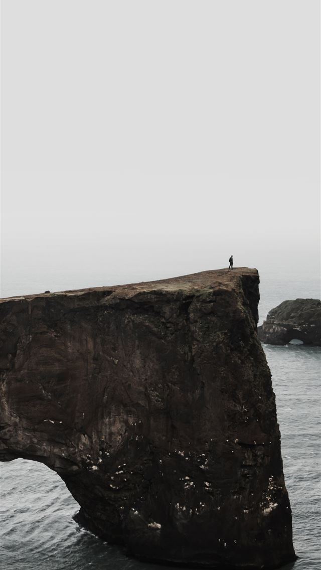 640x1136 gray rock on body of water - cave iPhone Wallpaper
