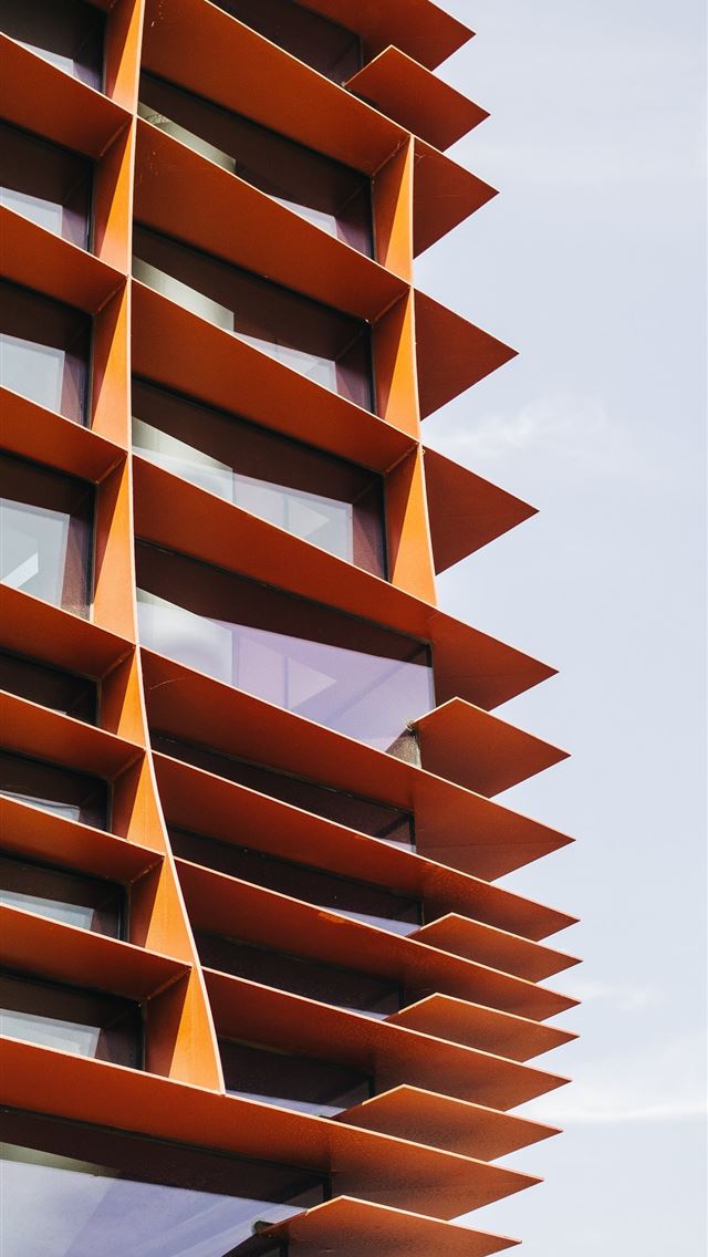 640x1136 photo of orange painted building - wood iPhone Wallpaper