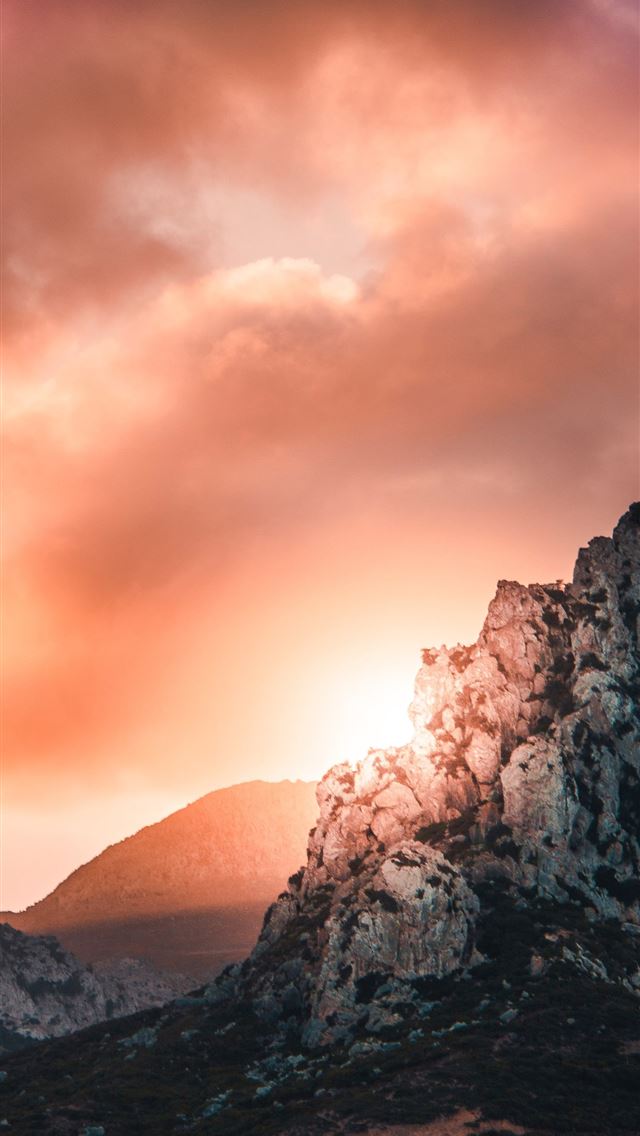 640x1136 black and gray hill under cloudy sky during sunset -  iPhone Wallpaper