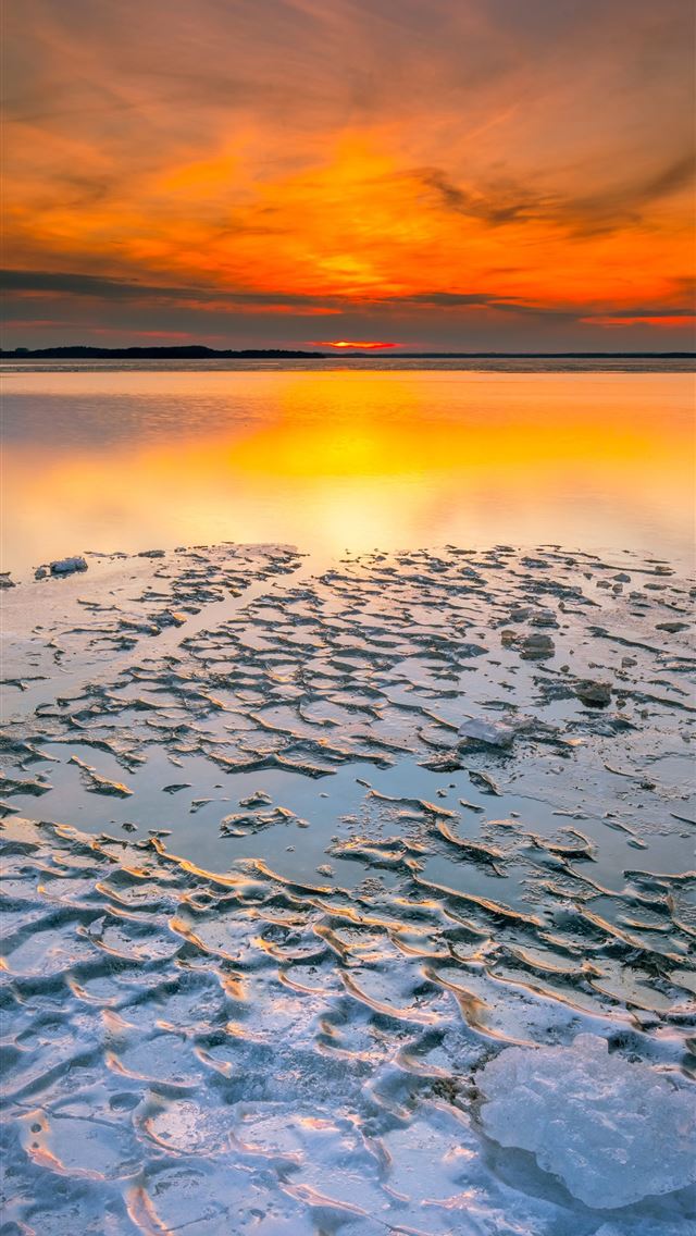 body of water during sunset iPhone wallpaper 