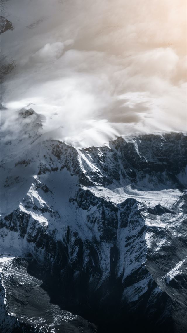 640x1136 snow covered mountain under cloudy sky during dayt... - swiss alps iPhone Wallpaper