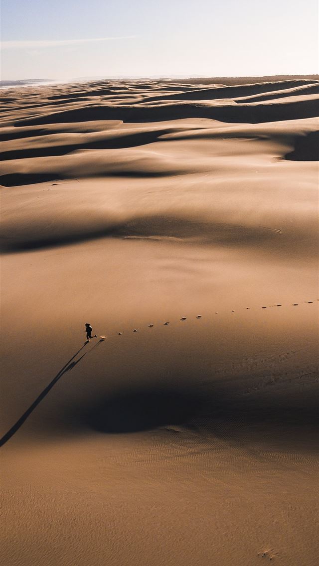 640x1136 person walking on the desert photography - australia iPhone Wallpaper