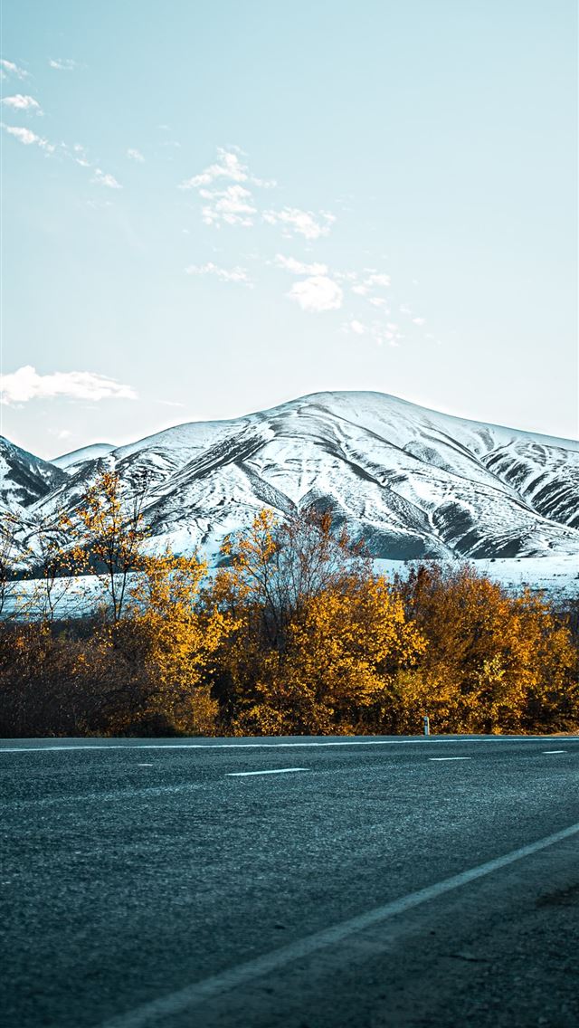 640x1136 gray asphalt road near snow covered mountain durin... - autumn iPhone Wallpaper