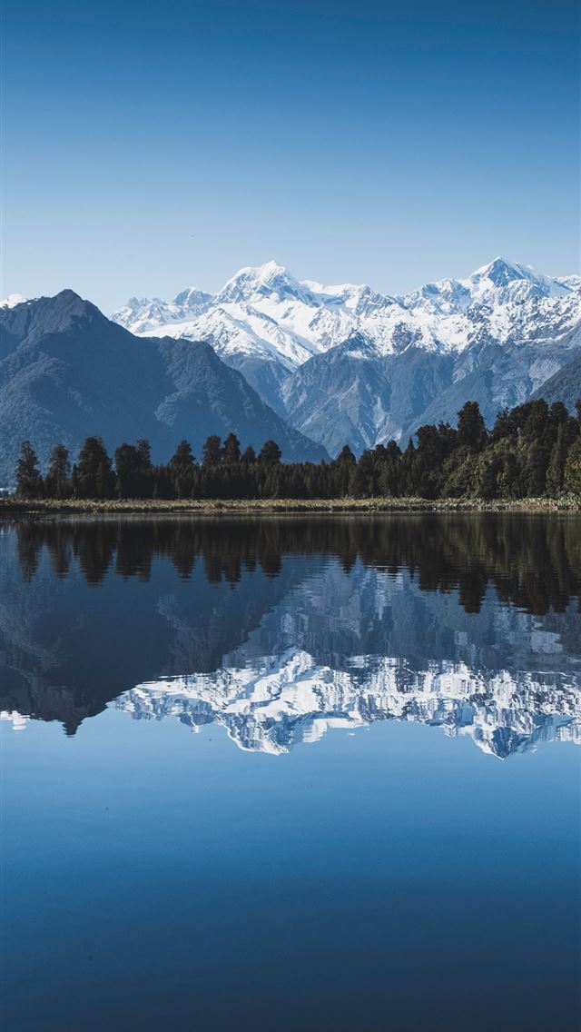 640x1136 body of water between green trees under clear blue... - new zealand iPhone Wallpaper