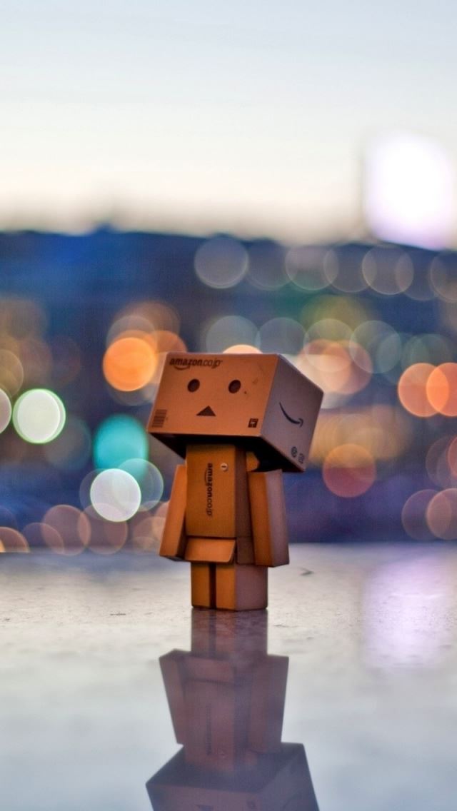 640x1136 Danbo In The City - yellow iPhone Wallpaper
