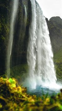 waterfalls on green moss covered rock wallpaper