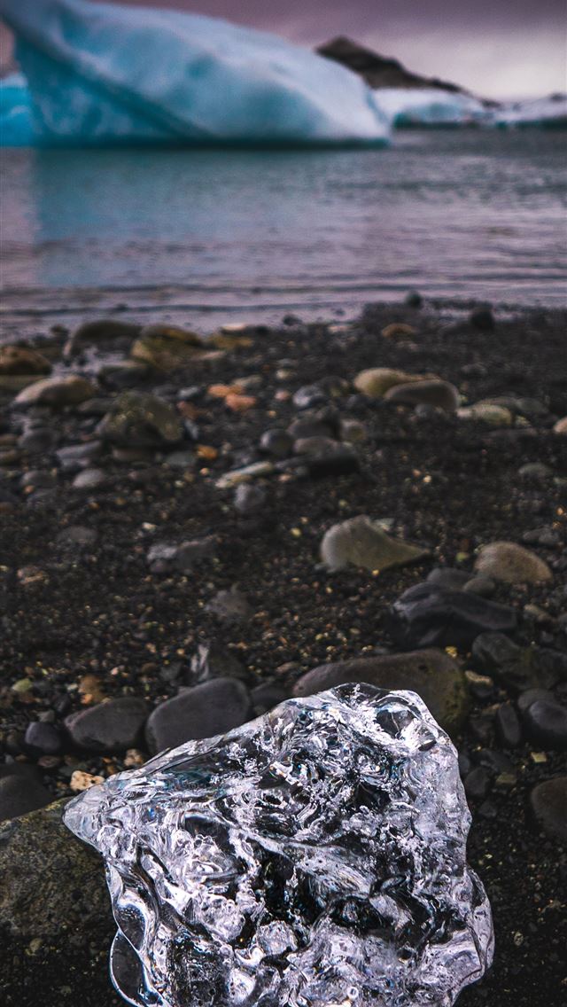 ice on rocky shore iPhone wallpaper 