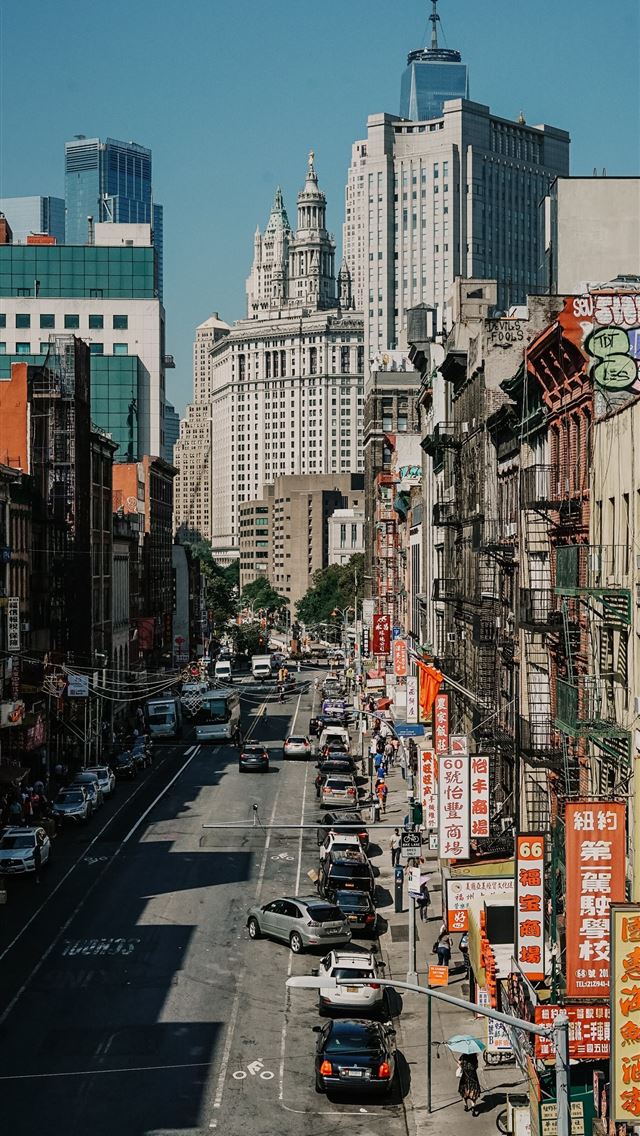 640x1136 vehicle near buildings -  iPhone Wallpaper