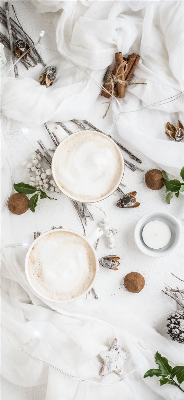 1125x2436 two white ceramic cups on white textle - winter iPhone X Wallpaper