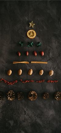 assorted color ornaments on black surface wallpaper