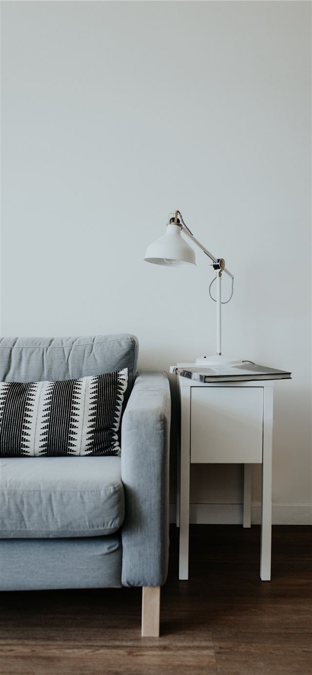 1125x2436 white study lamp on top of white wooden end table ... - grey iPhone X Wallpaper