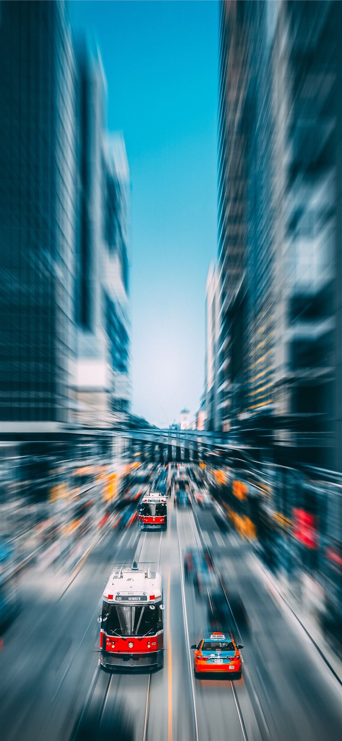 time lapse photography of vehicles in busy road iPhone X wallpaper 