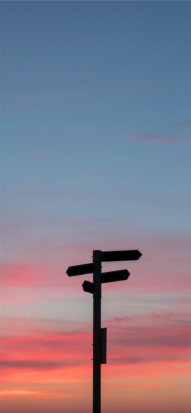 1125x2436 silhouette of a road signage during golden hour - cyan iPhone X Wallpaper