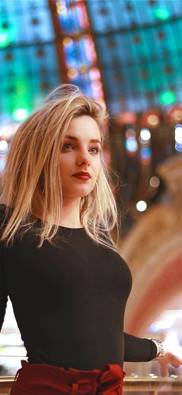 1125x2436 woman in black long sleeved shirt - france iPhone X Wallpaper