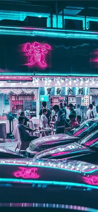 people walking near building wallpaper