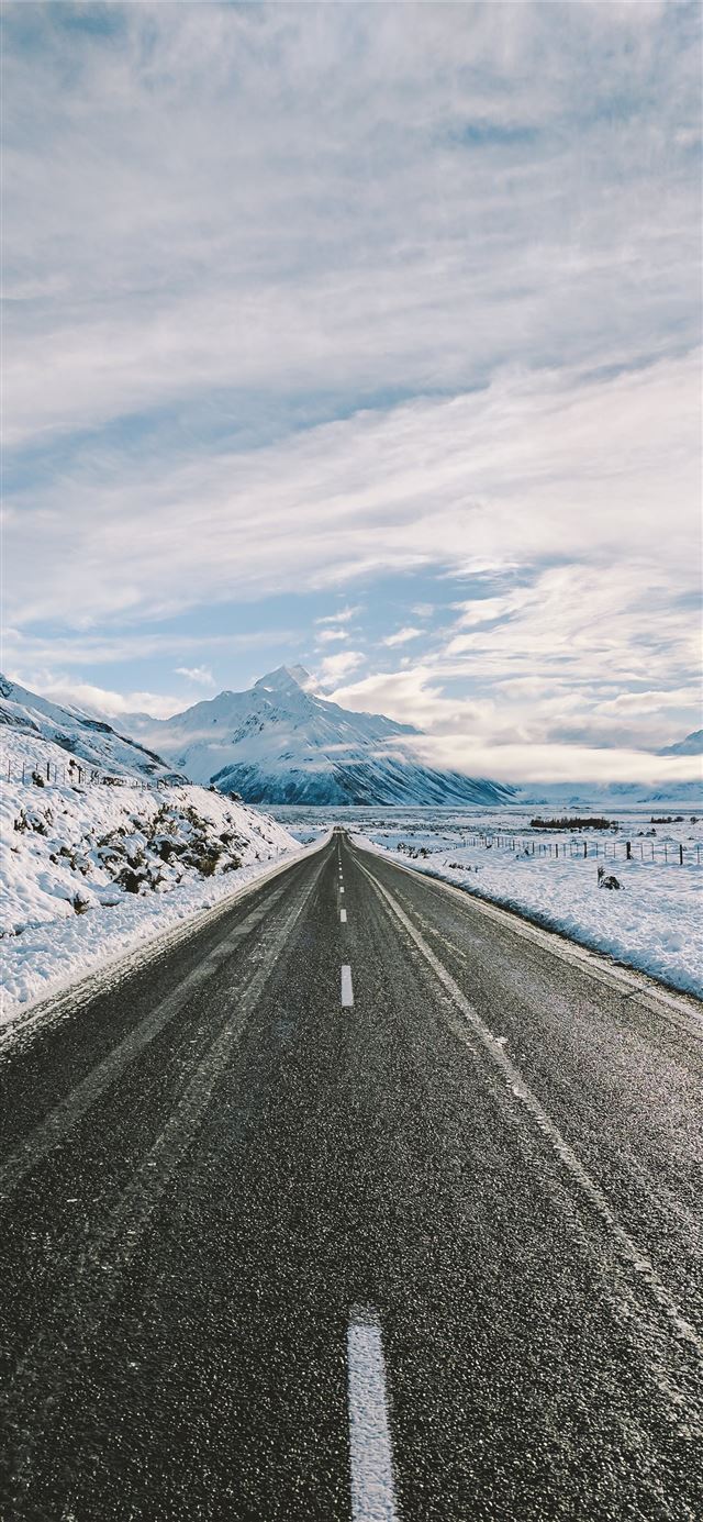 1125x2436 road near mountain covered with snow - winter iPhone X Wallpaper