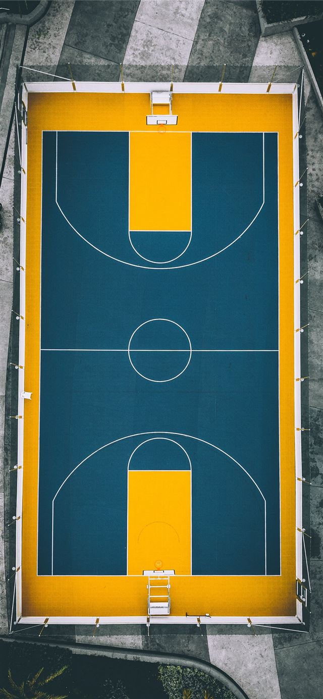 1125x2436 aerial view photography of yellow and blue basketb... - yellow iPhone X Wallpaper