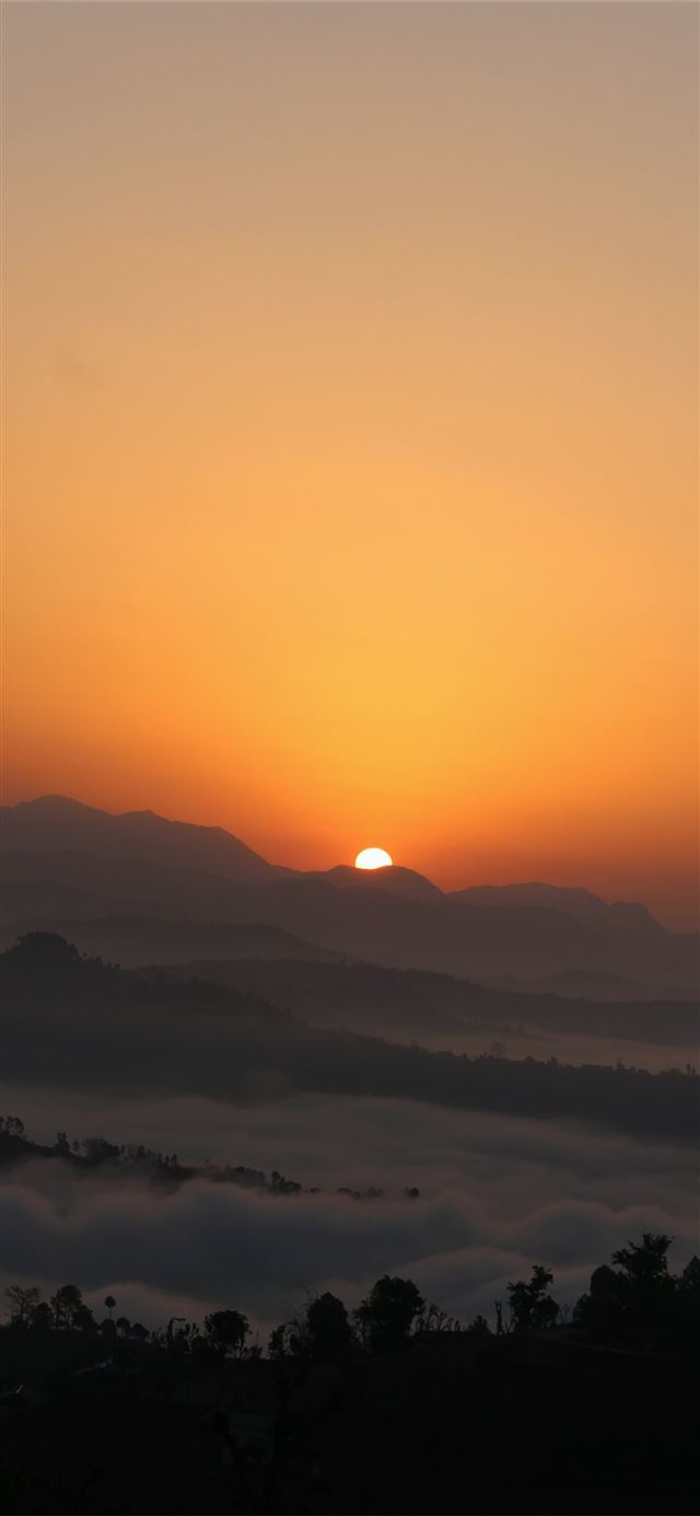 1125x2436 sun peeping on ice mountain -  iPhone X Wallpaper