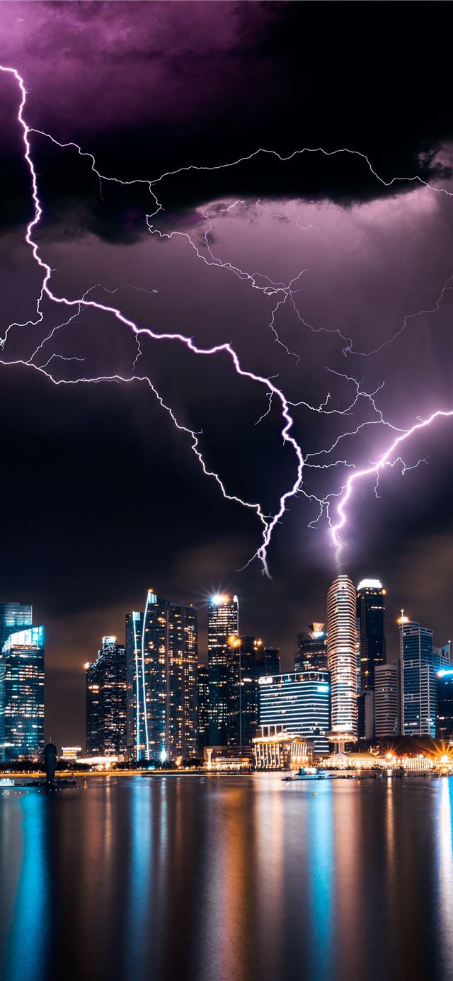 1125x2436 lightning storm over skyscrapers - singapore iPhone X Wallpaper
