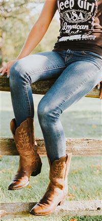 woman sitting on brown wooden fence wallpaper