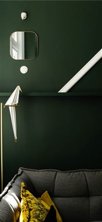 square framed mirror over gray sofa wallpaper