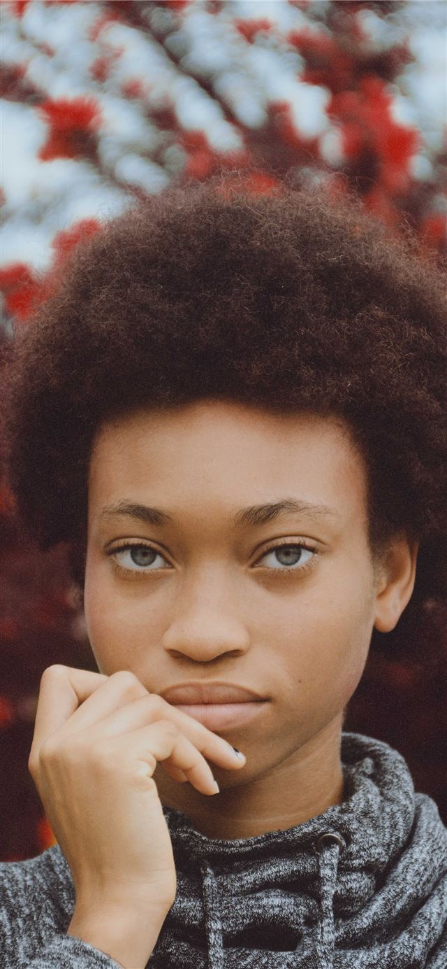 1125x2436 close up photography of woman putting her hand on ... - lagos iPhone X Wallpaper