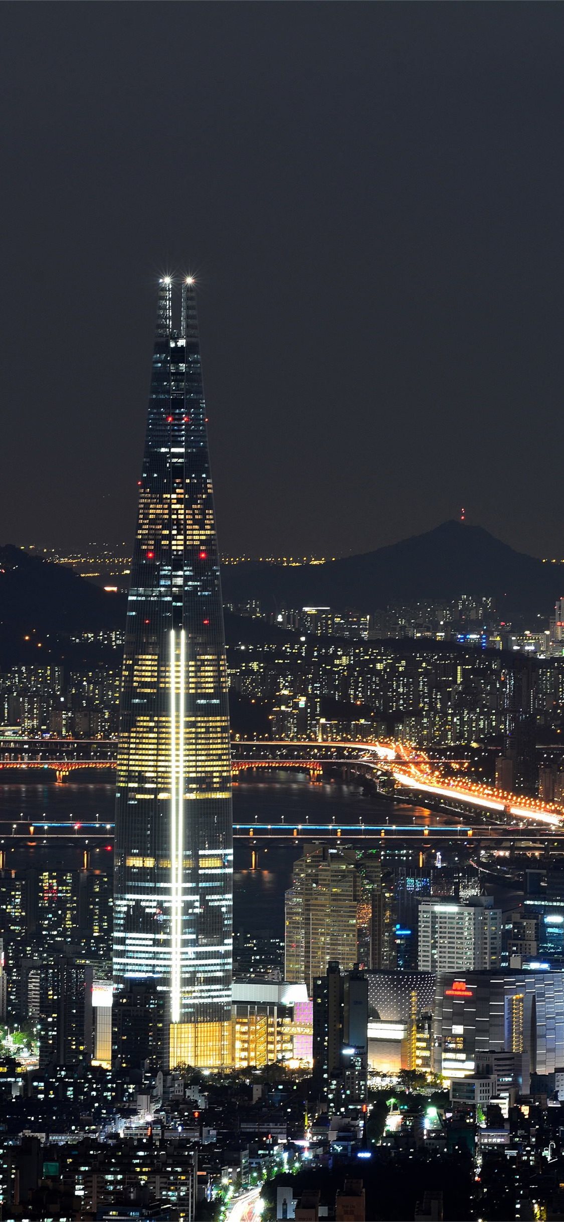 Lotte World Tower and the night lights of Seoul So... iPhone Wallpapers  Free Download