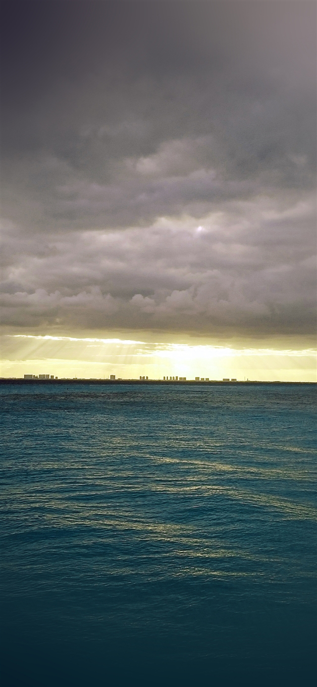 1125x2436 Sea city blue ocean nature sky cloud blur - blue iPhone X Wallpaper