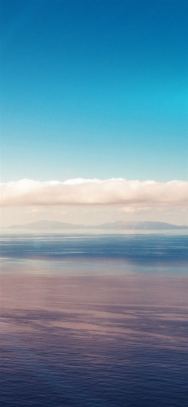 1125x2436 Blue sky ocean view flare - flare iPhone X Wallpaper