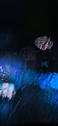 Raining window bokeh blue light wallpaper