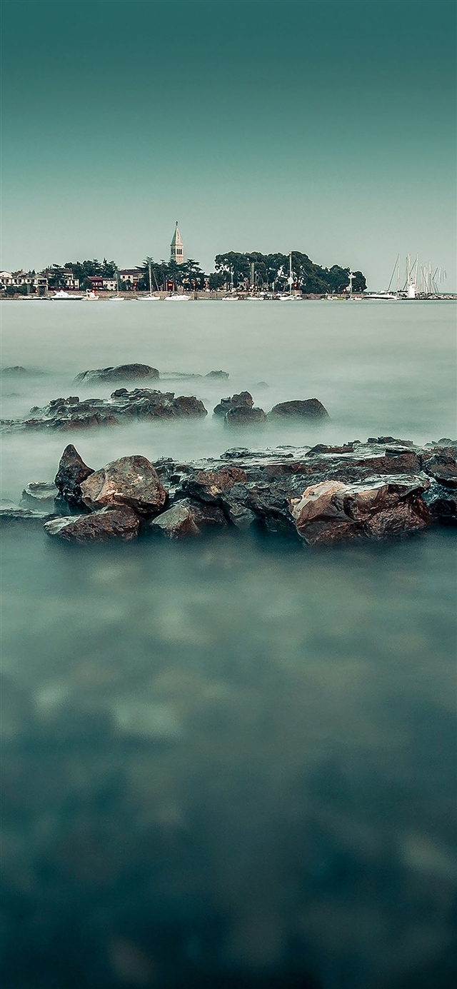 1125x2436 Foggy island sea - green iPhone X Wallpaper