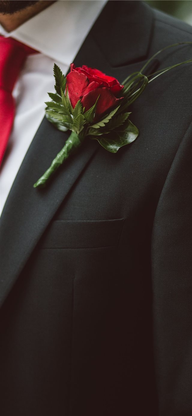 1125x2436 Groom wearing a red flower - rose iPhone X Wallpaper