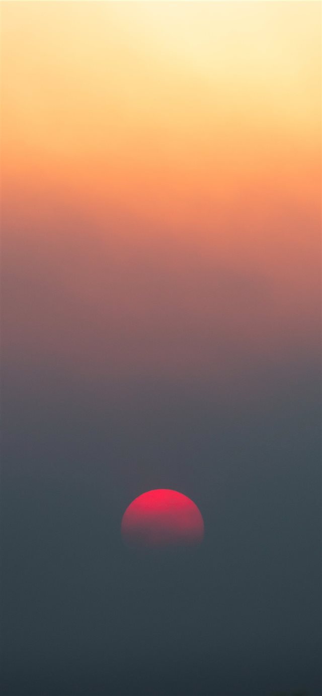 1125x2436 Burning sky - sun iPhone X Wallpaper