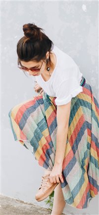 Girl in rainbow skirt wallpaper