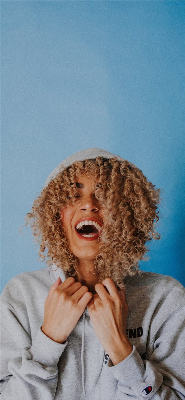 1125x2436 Nadhia doing what she enjoys most   laughing  - happy iPhone X Wallpaper
