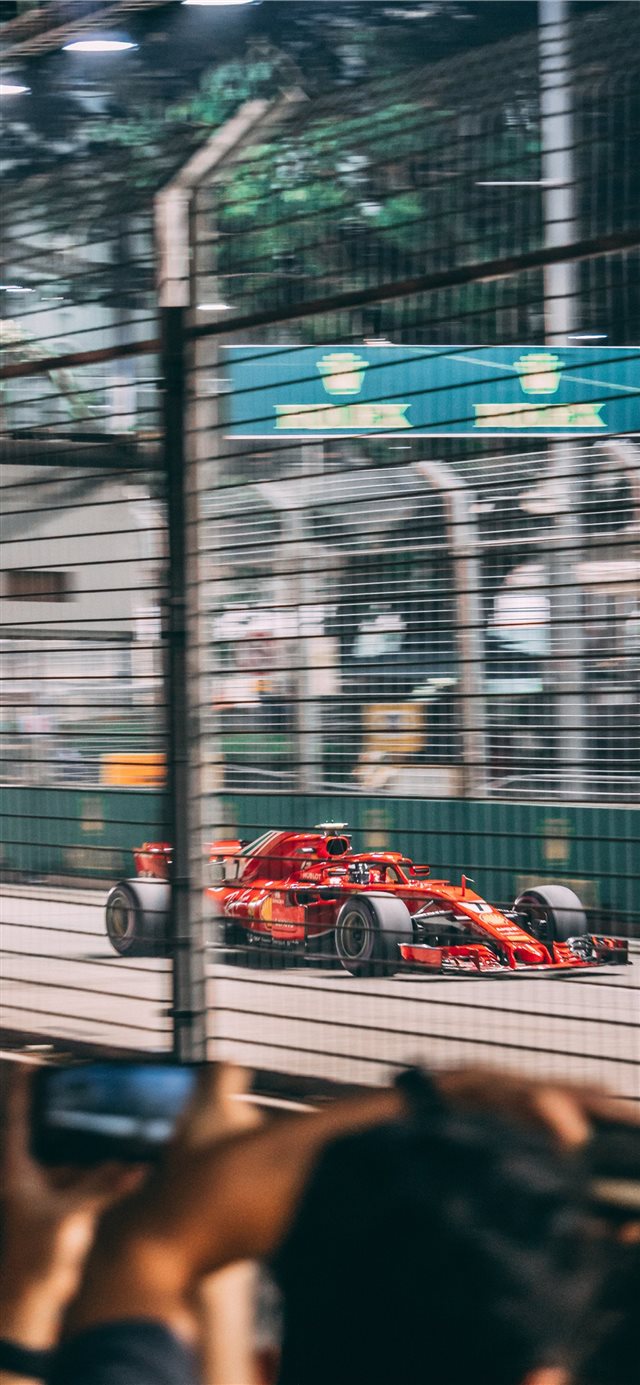 1125x2436 Cherry Red Ferrari - blur iPhone X Wallpaper
