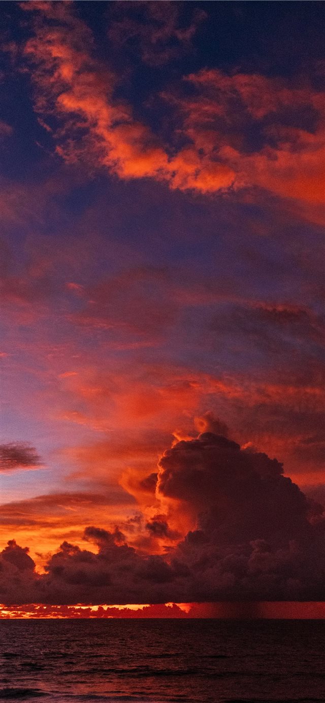 1125x2436 ocean under orange colored clouds - sunset iPhone X Wallpaper