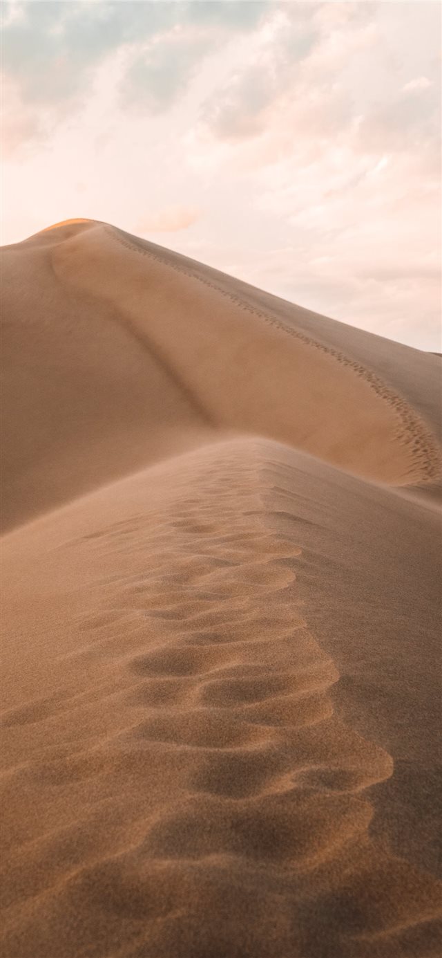 1125x2436 Hiking in the Great Sand Dunes National Park the m... - soil iPhone X Wallpaper