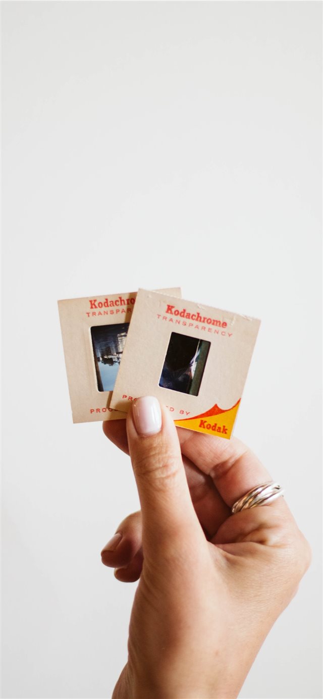1125x2436 Old school kodak film slides - usa iPhone X Wallpaper