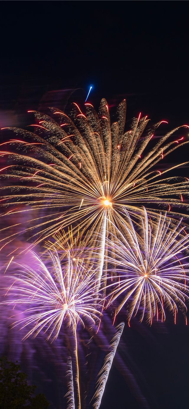 1125x2436 2019 fireworks over Jack Trice Stadium in Ames Iow... - flare iPhone X Wallpaper