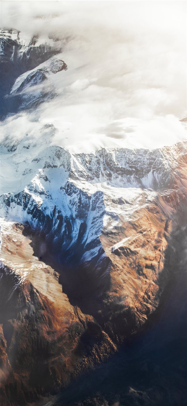 1125x2436 'High above the Clouds' - snow iPhone X Wallpaper
